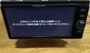 NSZT-W66T car navigation screen showing map SD card error message with fix instructions