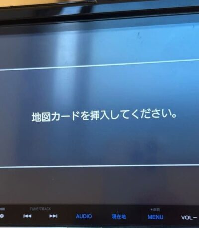 VXM-165VFEi sd card head unit displaying Apple CarPlay interface with iPhone connected via USB cable after SD card installation