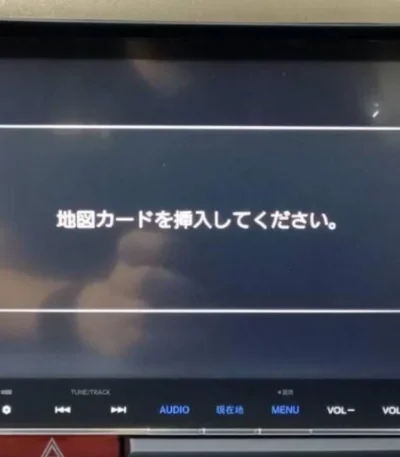 VXM-165VFNi infotainment system showing insert map SD card error blocking Apple CarPlay activation