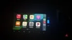 VXM-175VFi head unit displaying Apple CarPlay interface with iPhone connected via USB cable after SD card installation