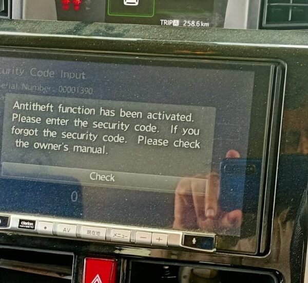 Clarion NXV987D Radio Code displaying unlock code entry screen with step-by-step solution guide"