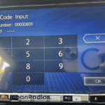 Clarion NXV897D radio code, Clarion NXV897D car radio displaying 'CODE' prompt on screen with unlock solution instructions