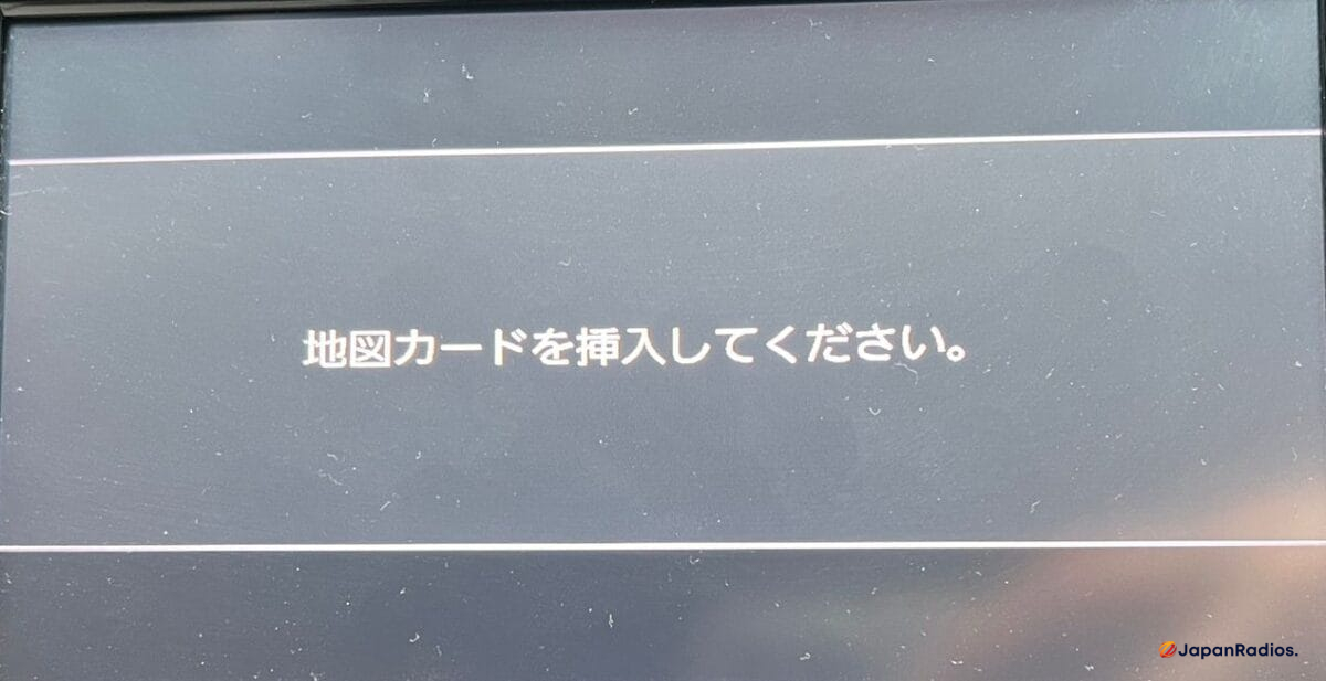 SD card firmware update error on VXM-185VFEi head unit. Fix update failure for Honda navigation and CarPlay systems.