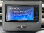 Kenwood MDV-D304W car stereo showing 'CODE' security prompt with permanent unlock solution guide"