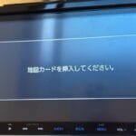 VXM-165VFEi sd card head unit displaying Apple CarPlay interface with iPhone connected via USB cable after SD card installation