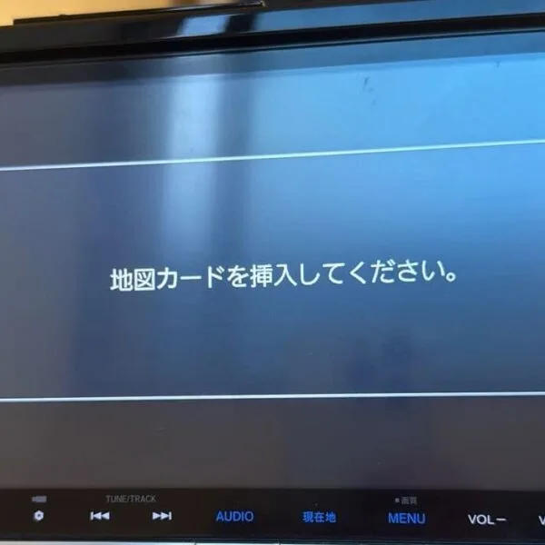 VXM-165VFEi sd card head unit displaying Apple CarPlay interface with iPhone connected via USB cable after SD card installation