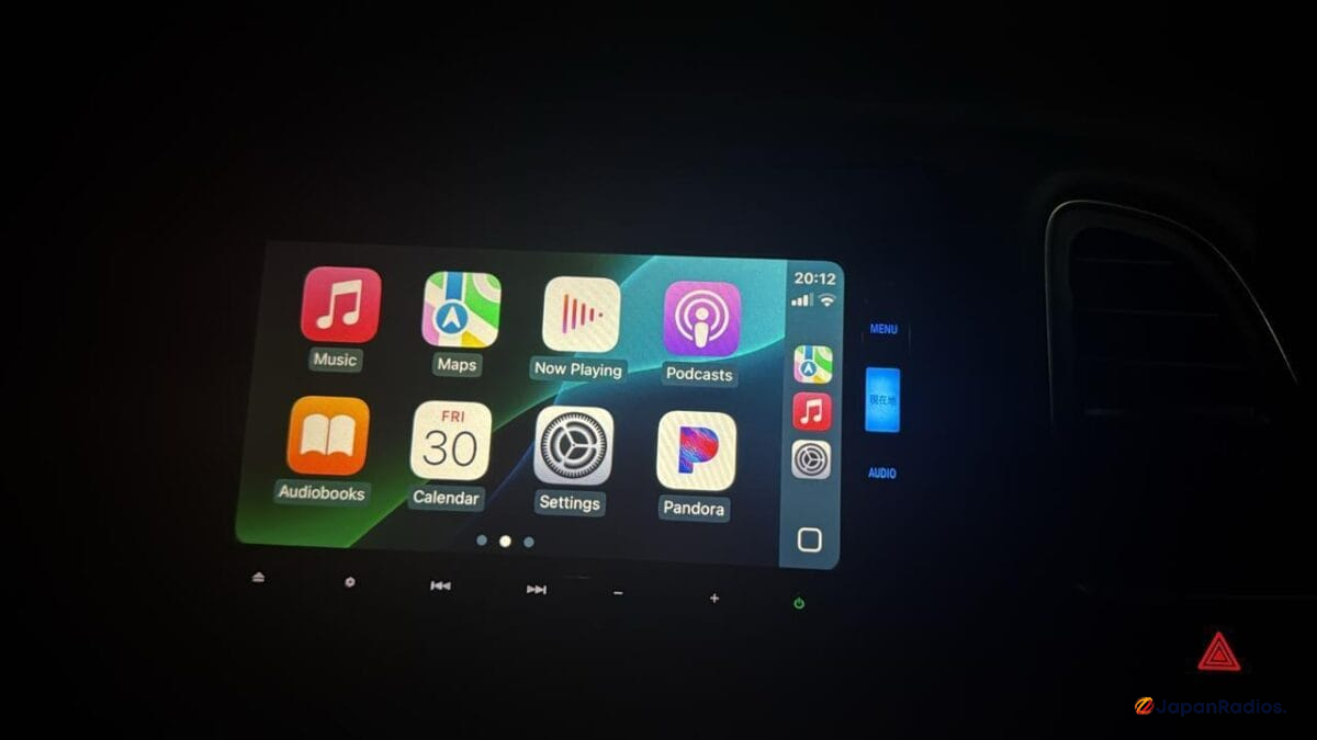 VXM-175VFi head unit displaying Apple CarPlay interface with iPhone connected via USB cable after SD card installation