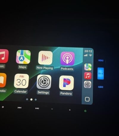 VXM-175VFi head unit displaying Apple CarPlay interface with iPhone connected via USB cable after SD card installation