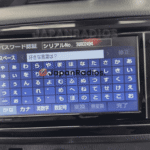 Locked Toyota Vitz navigation unit displaying security screen requiring a Toyota Vitz Radio Unlock Code.